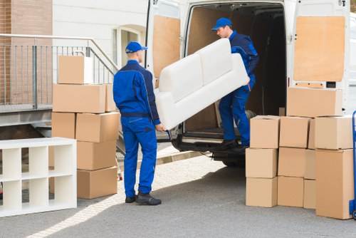 Loading furniture into a moving van for a Westwickham delivery