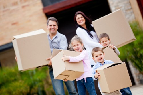 Professional removal team handling furniture during a Westwickham move