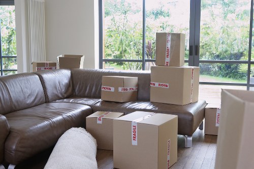 A packing team organizing household boxes in Westwickham